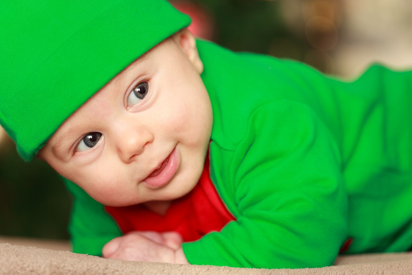 Canon EOS 5D Mark II sample photo. Baby, wearing, green, and photography