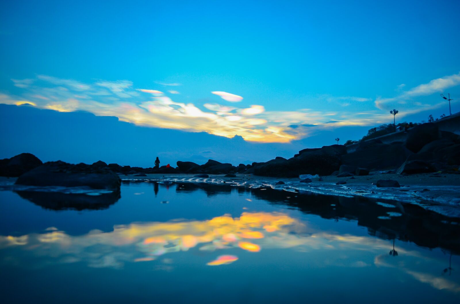 Nikon D7000 sample photo. Cloud iridescence, team colors photography