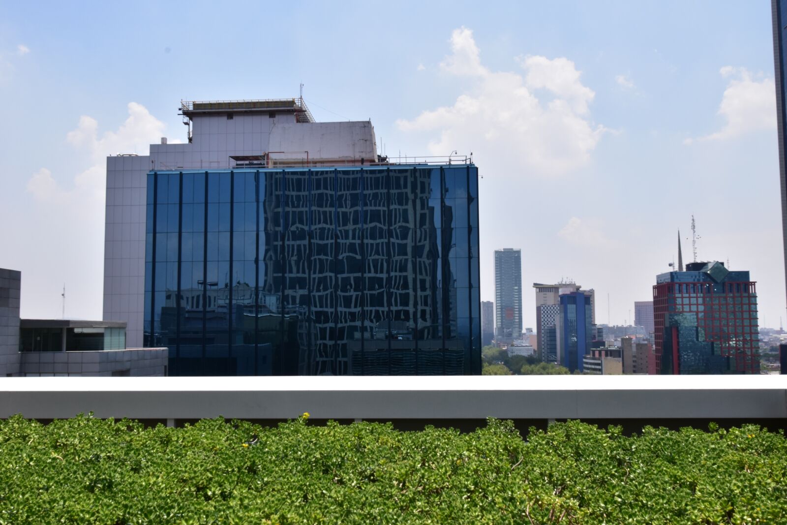 Nikon D5600 sample photo. City, buildings, clouds photography