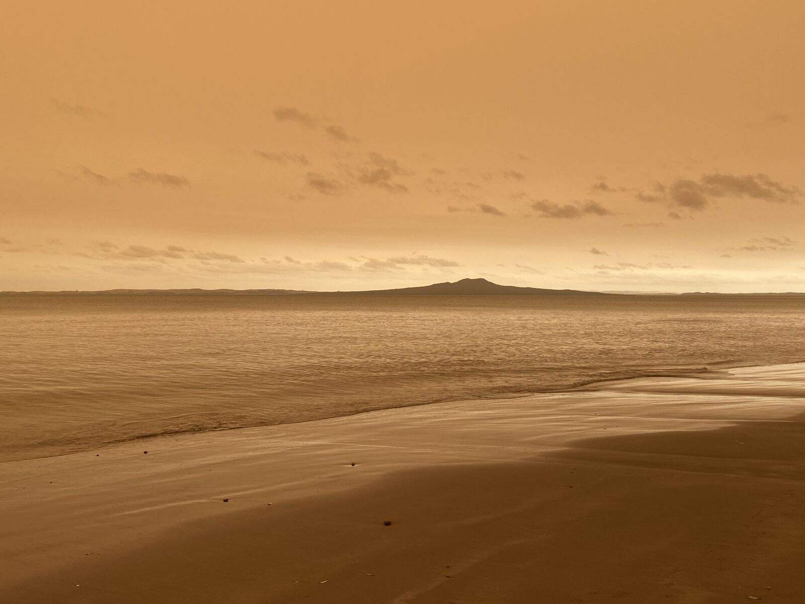 Apple iPhone 11 Pro Max sample photo. Rangitoto, sepia, sky photography