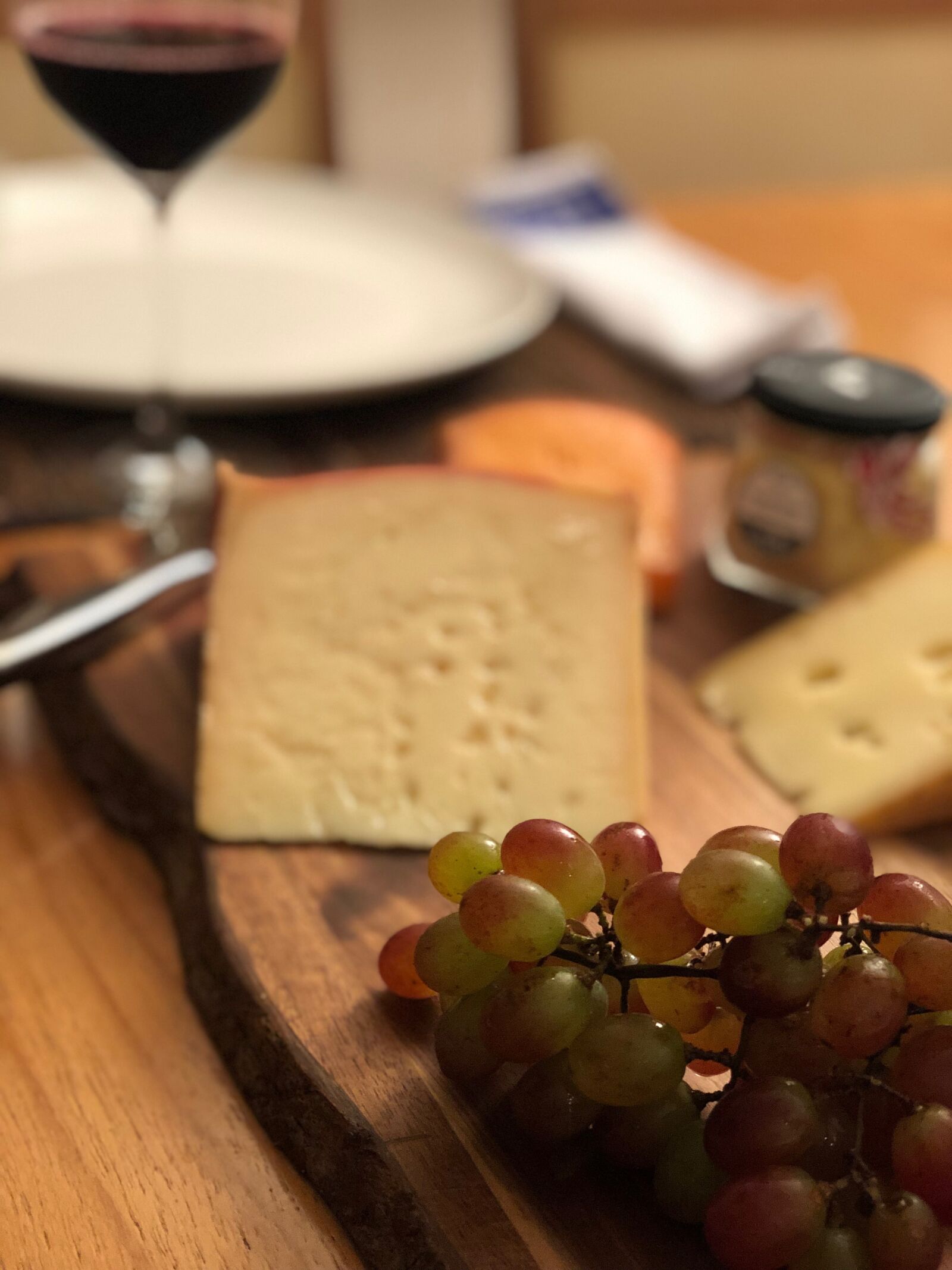 iPhone X back dual camera 6mm f/2.4 sample photo. Cheese, grape, grapes photography