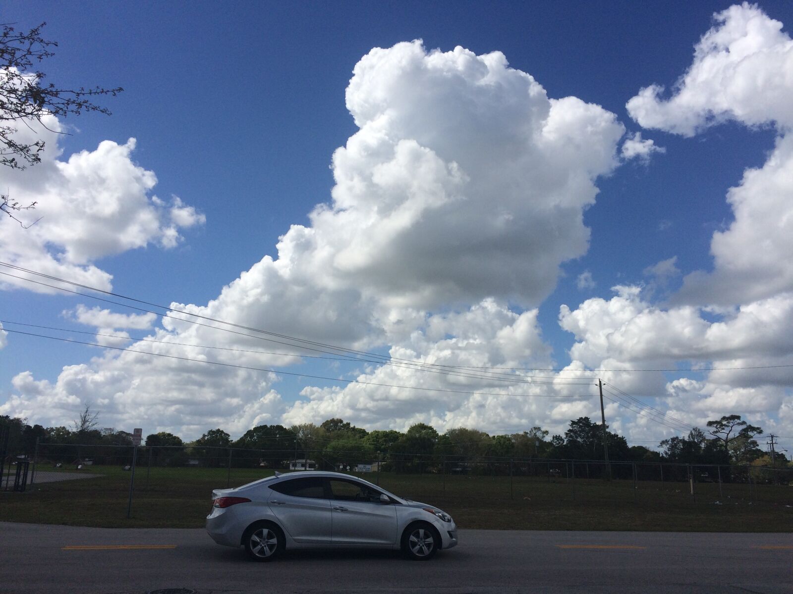 iPhone 5s back camera 4.15mm f/2.2 sample photo. Sky, car, travel photography