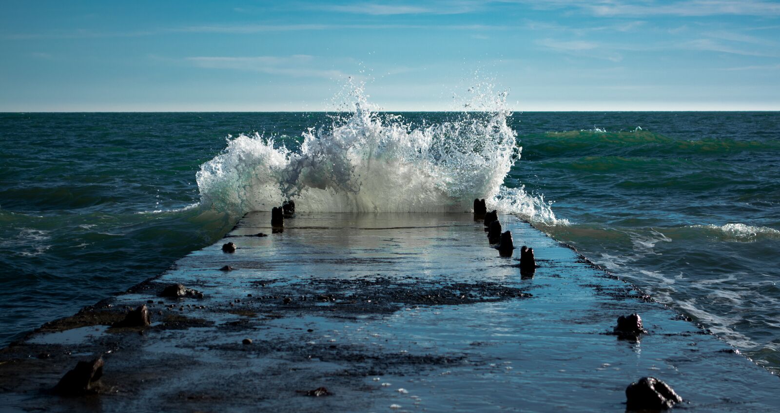 Nikon D5200 sample photo. Wave, pier, pierce photography