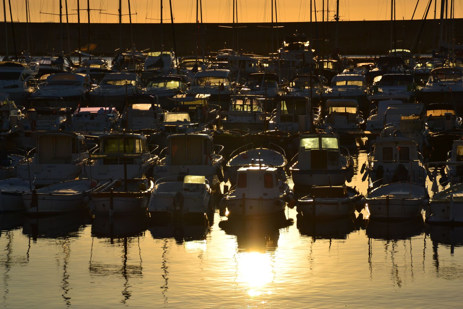 Nikon D3100 sample photo. Sunset, pier, boats photography