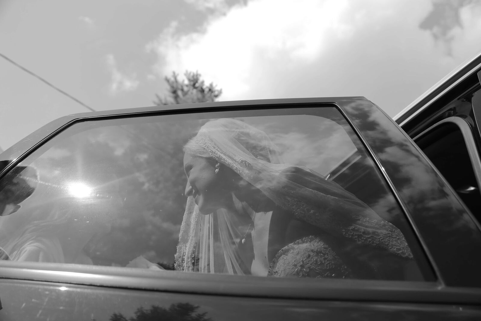 Canon EF 24-105mm F4L IS USM sample photo. Window, car, wedding dress photography