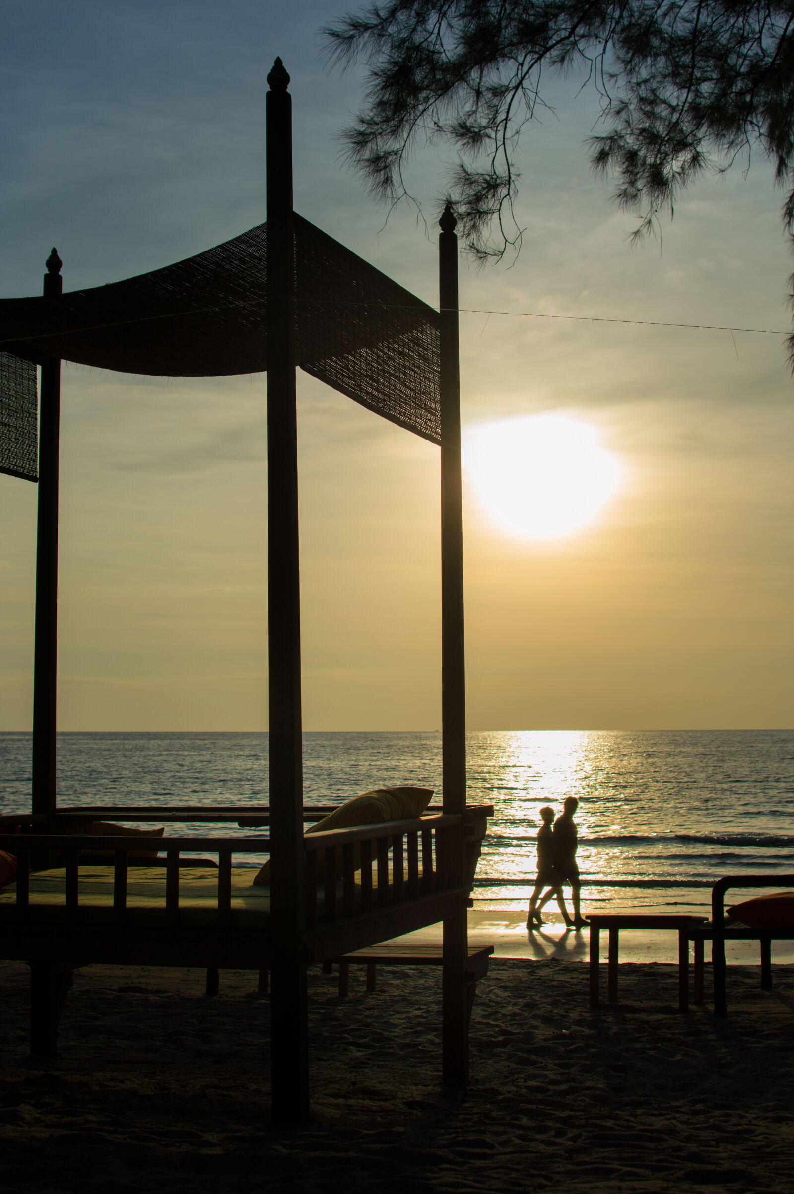 Nikon AF-S DX Nikkor 35mm F1.8G sample photo. Beach, beach, chair, sunset photography