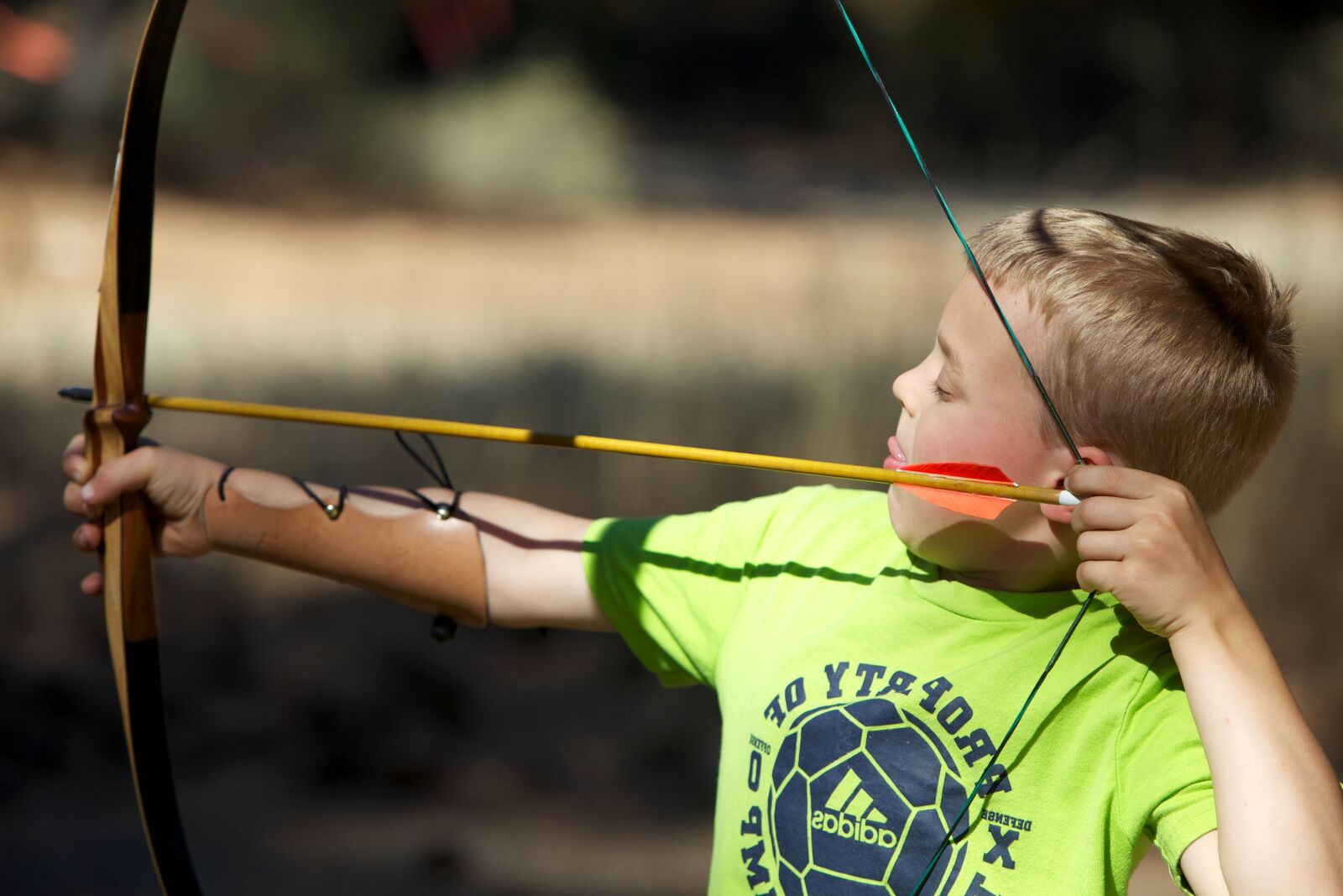Canon EOS 5D Mark II sample photo. Child, boy, bow, arrow photography