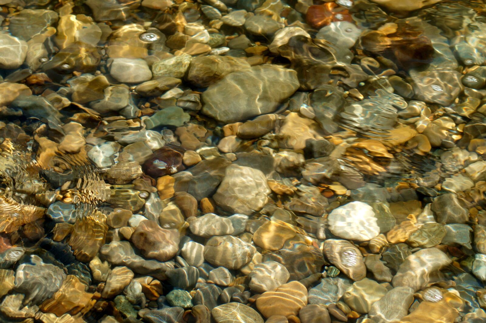 Sony SLT-A58 sample photo. Pebble, water, pebbles photography