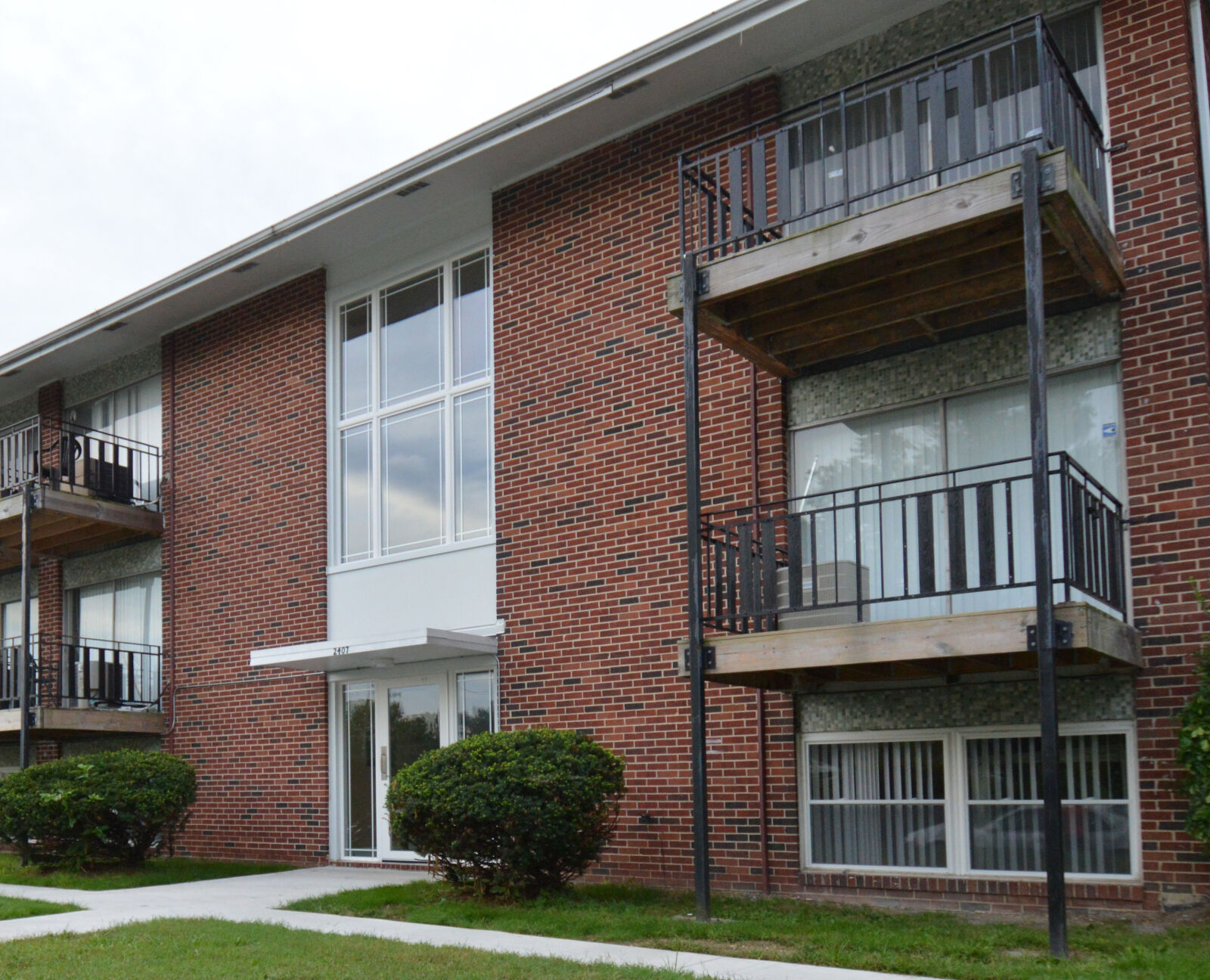 Nikon D3200 sample photo. Multifamily, apartments, garden, style photography