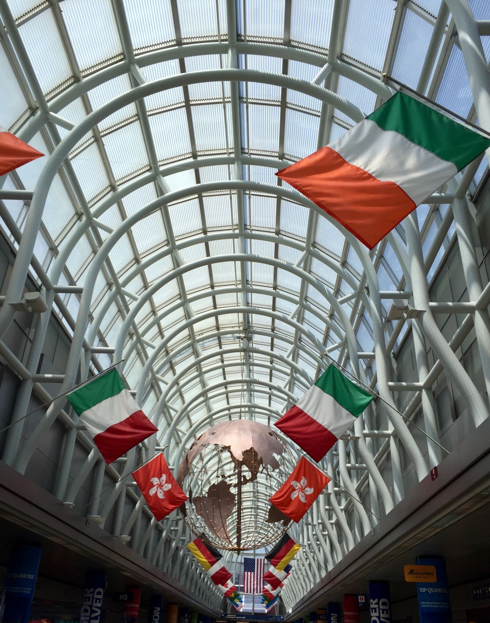 Apple iPhone 6 sample photo. Flags, airport, travel photography