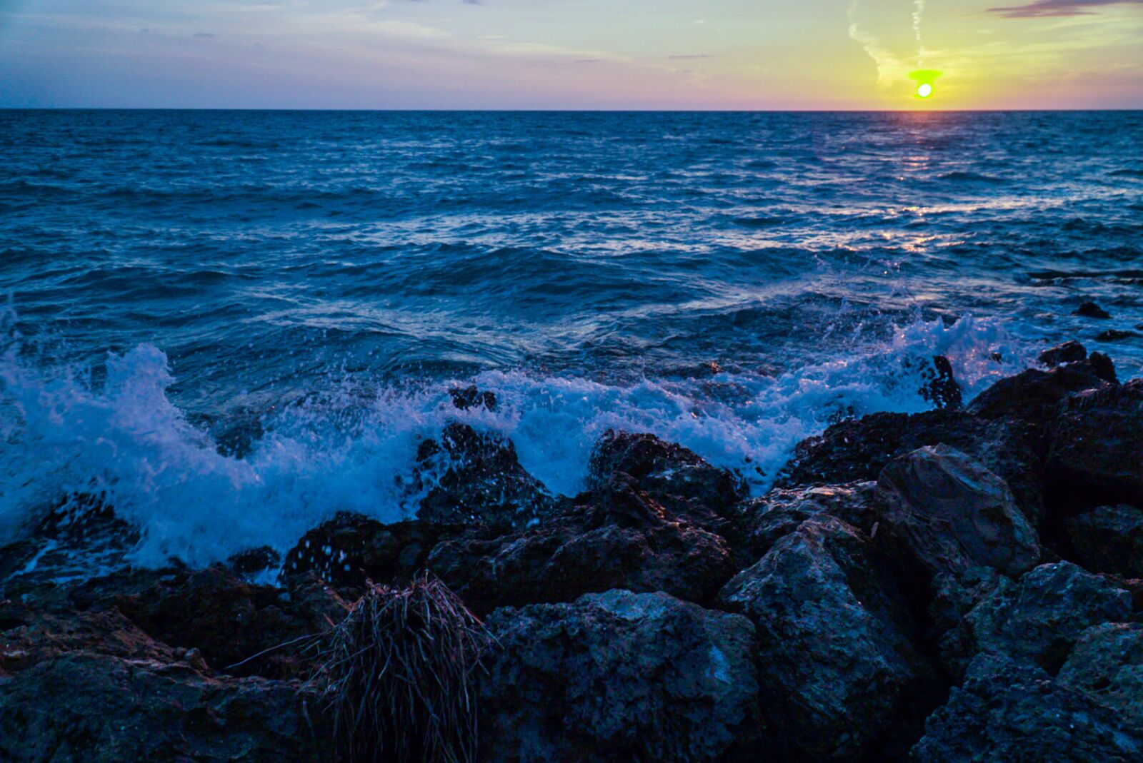 Sony E PZ 18-105mm F4 G OSS sample photo. Rocks, sunset, beach photography