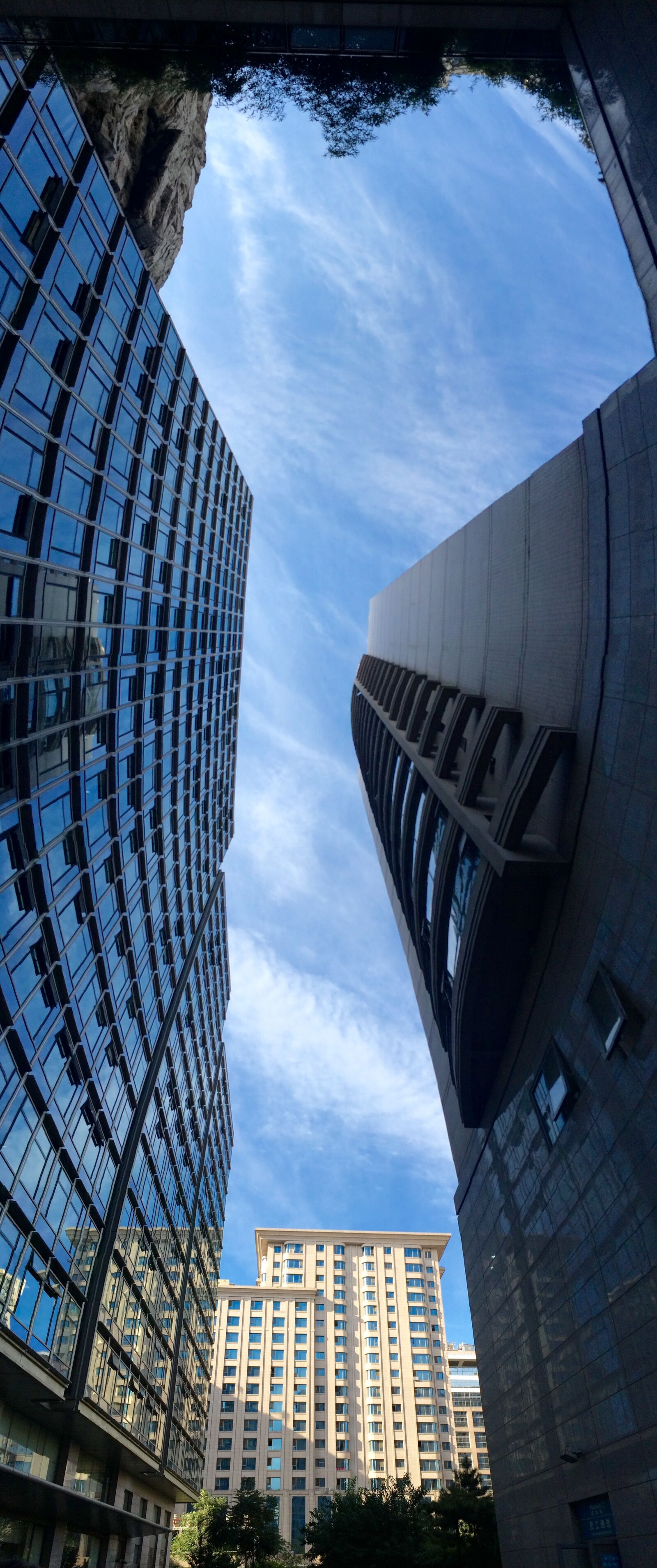 iPhone 5s back camera 4.15mm f/2.2 sample photo. Blue sky, building, city photography