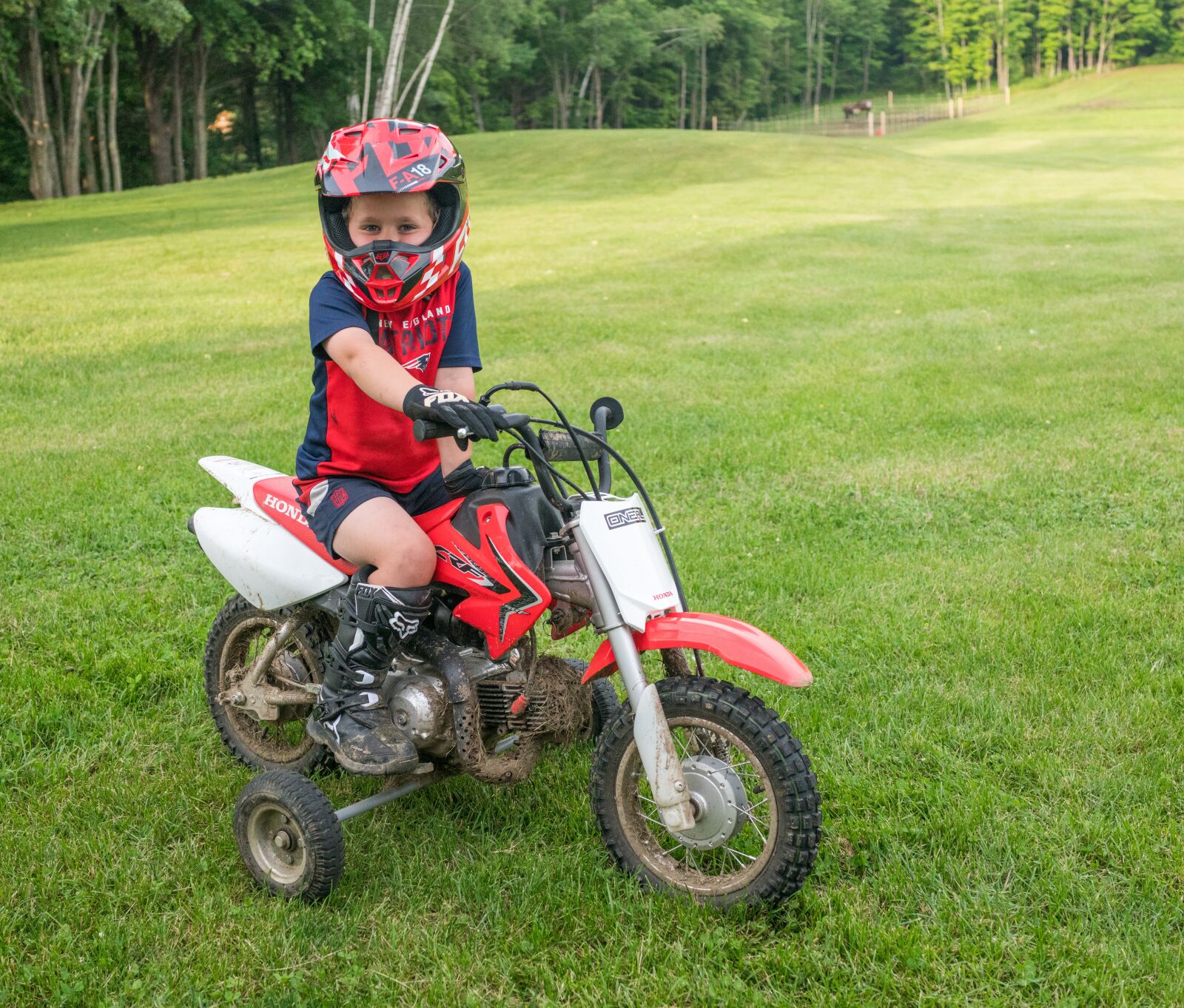 35mm F2.0 sample photo. Dirt bike, training wheels photography