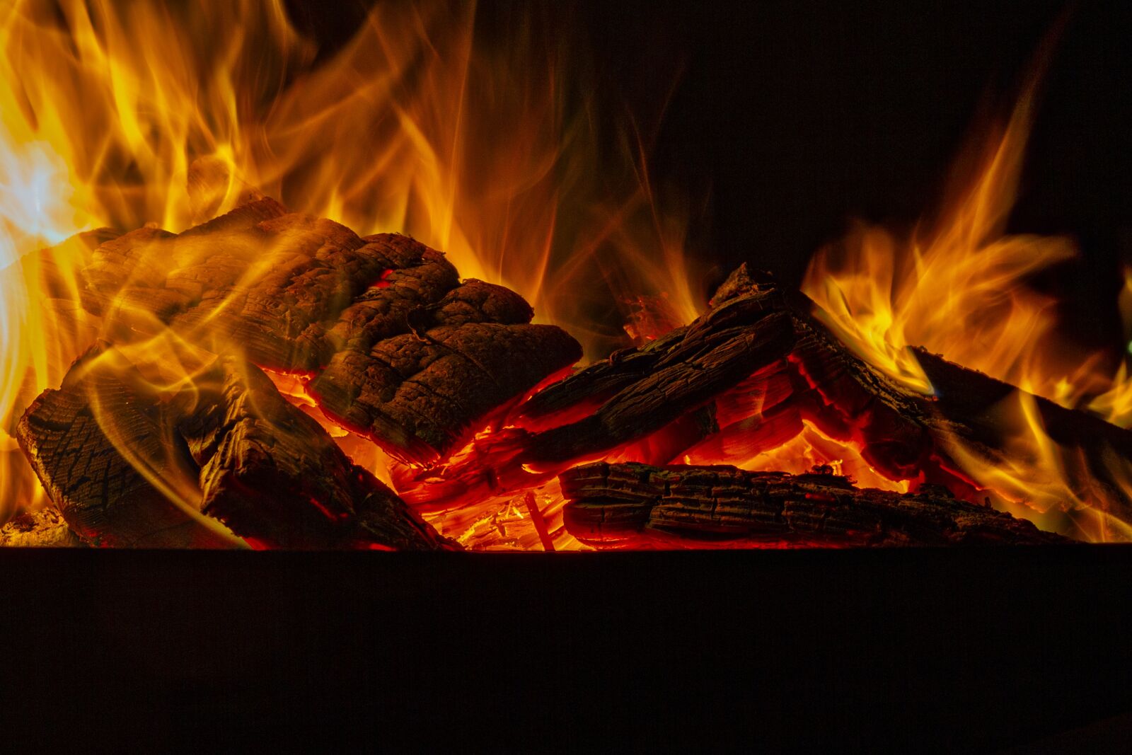 Canon EF-S 17-85mm F4-5.6 IS USM sample photo. Fire, red, ember photography