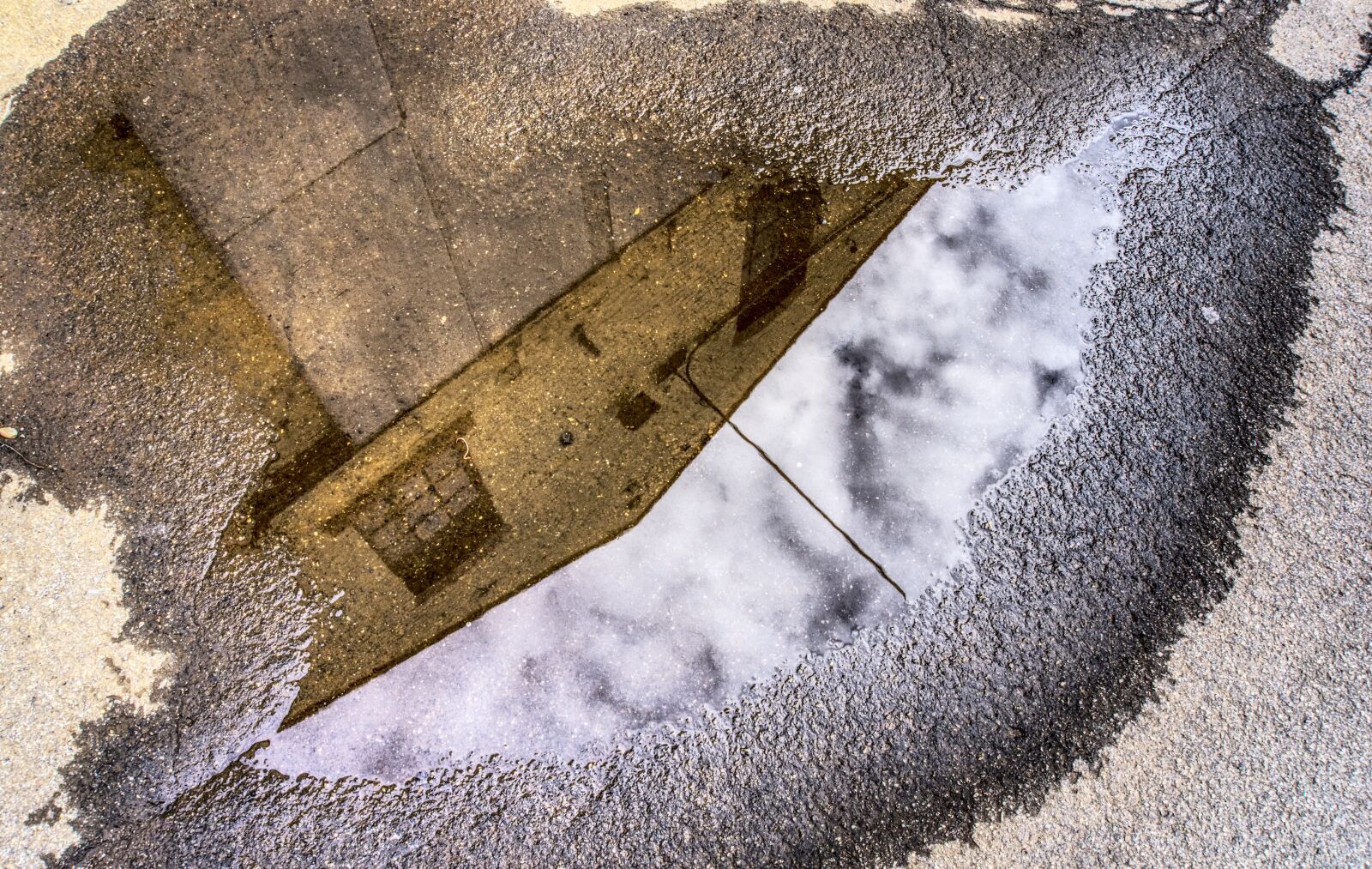 Sony E 16-50mm F3.5-5.6 PZ OSS sample photo. Mirroring, puddle, puddle photography photography