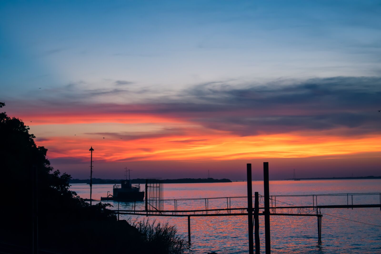 Nikon D3400 sample photo. Sunset, river, boats photography