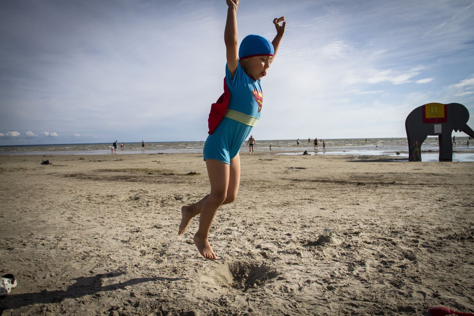Tamron AF 18-270mm F3.5-6.3 Di II VC LD Aspherical (IF) MACRO sample photo. Superman, beach, jump photography