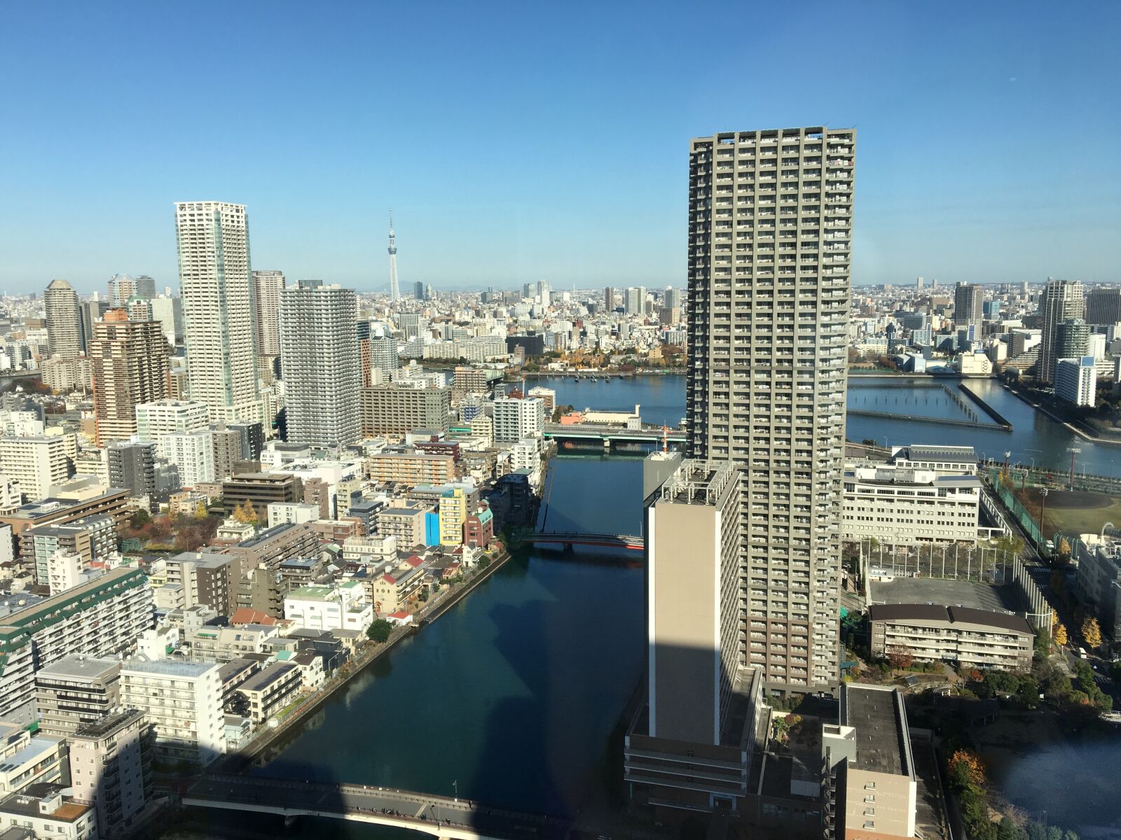 Apple iPhone 6s sample photo. Cityscape, against, clear, sky photography