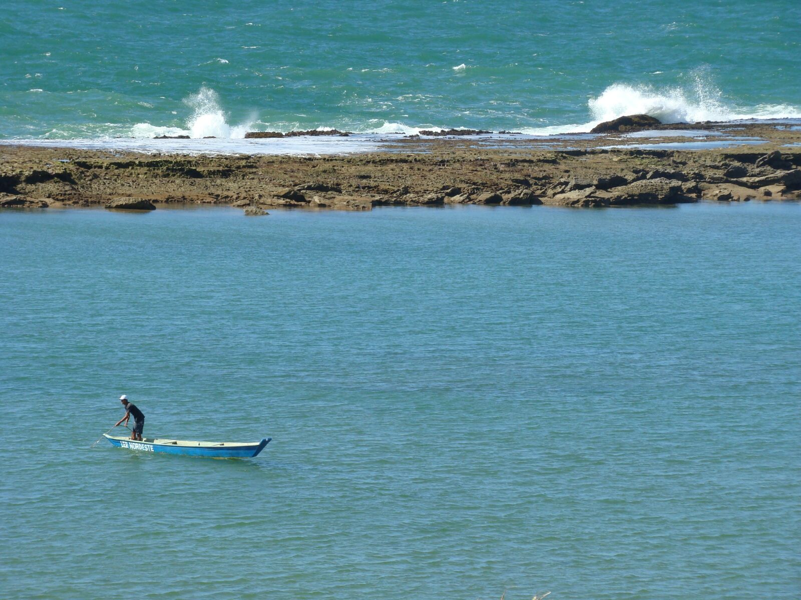 Sony DSC-H9 sample photo. Ocean, boat, fisherman photography