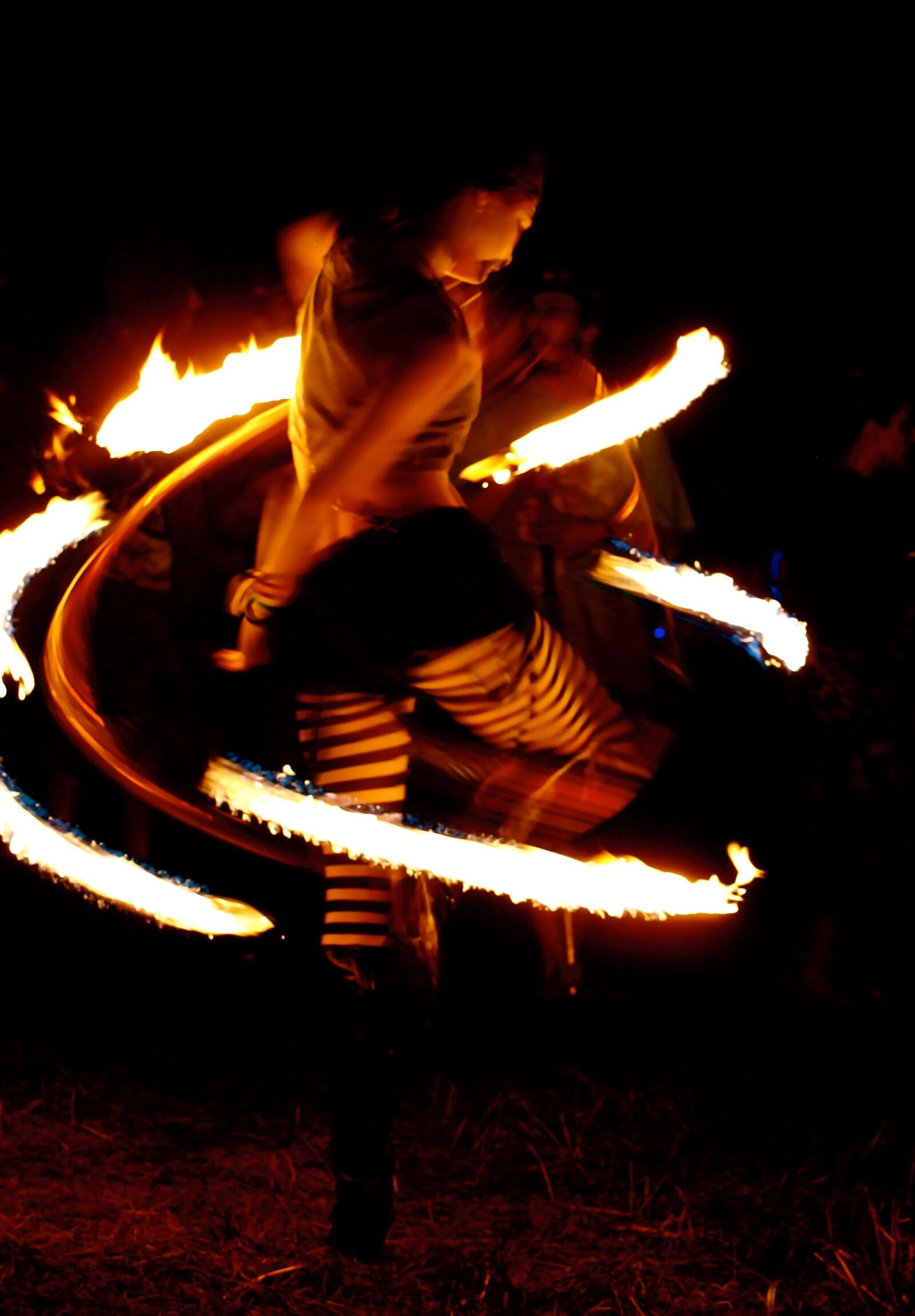 Olympus E-3 sample photo. Fire, fire dancer, tights photography