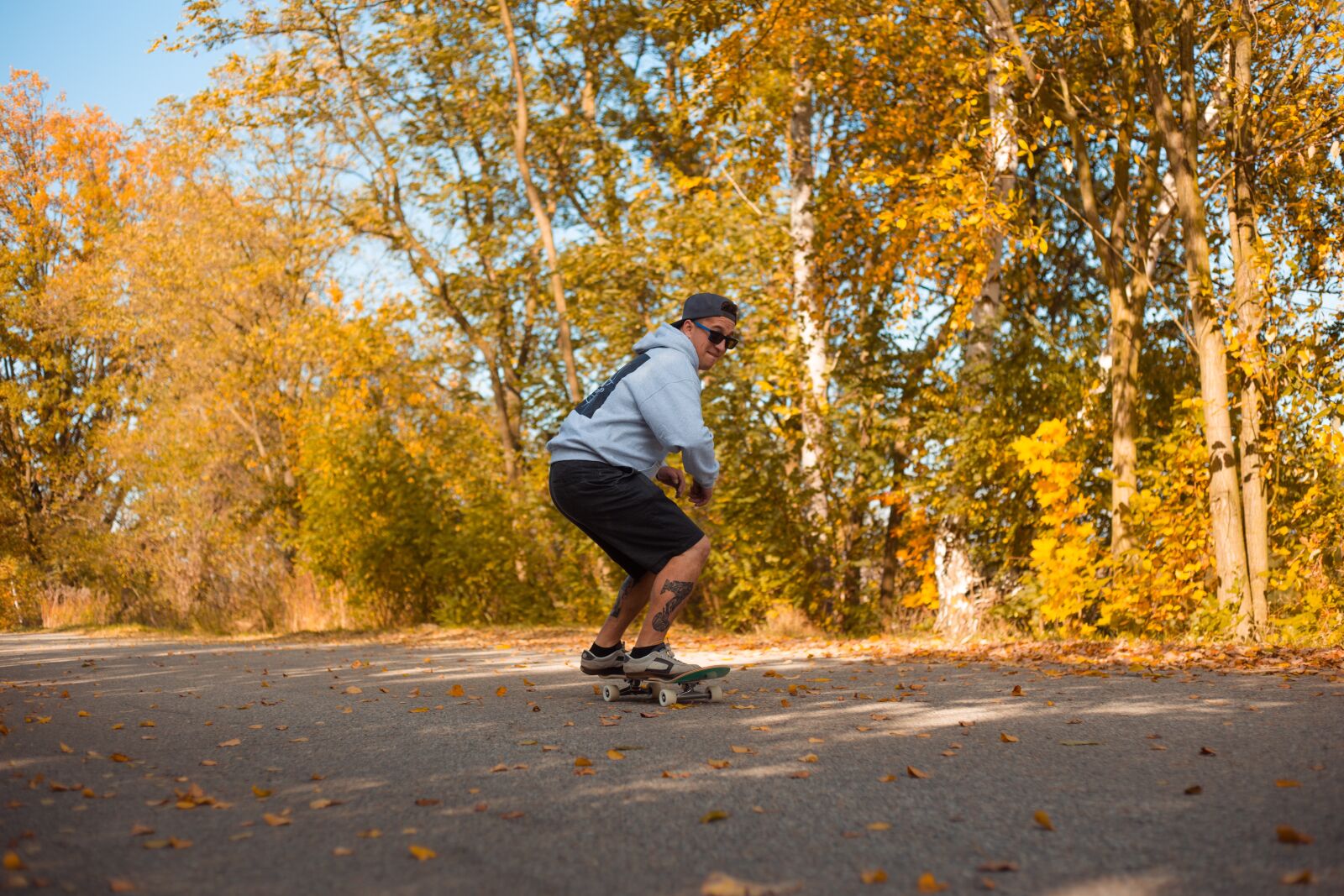 Canon EF 50mm F1.8 II sample photo. Skateboard, man, autumn photography