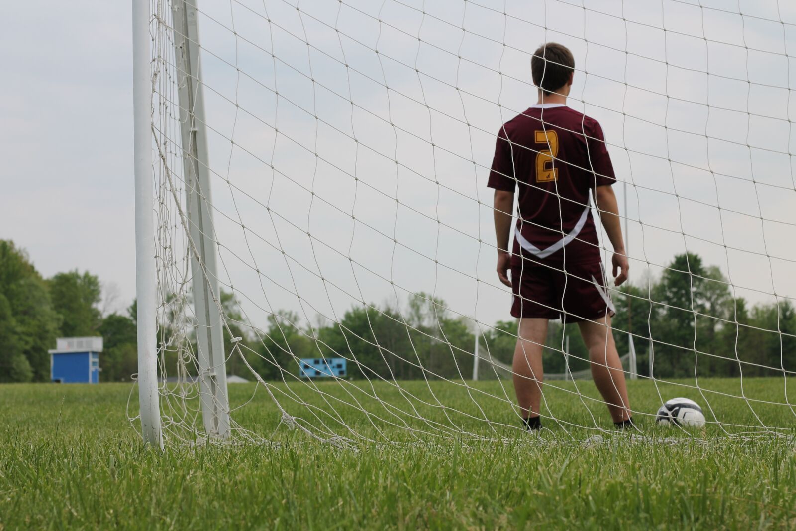 Canon EOS 1100D (EOS Rebel T3 / EOS Kiss X50) sample photo. Soccer, senior photo, field photography