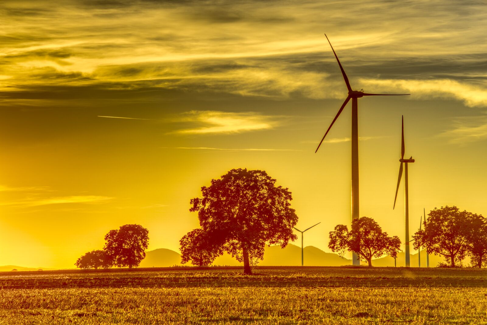 Sony a6000 sample photo. Sunset, pinwheel, wind energy photography