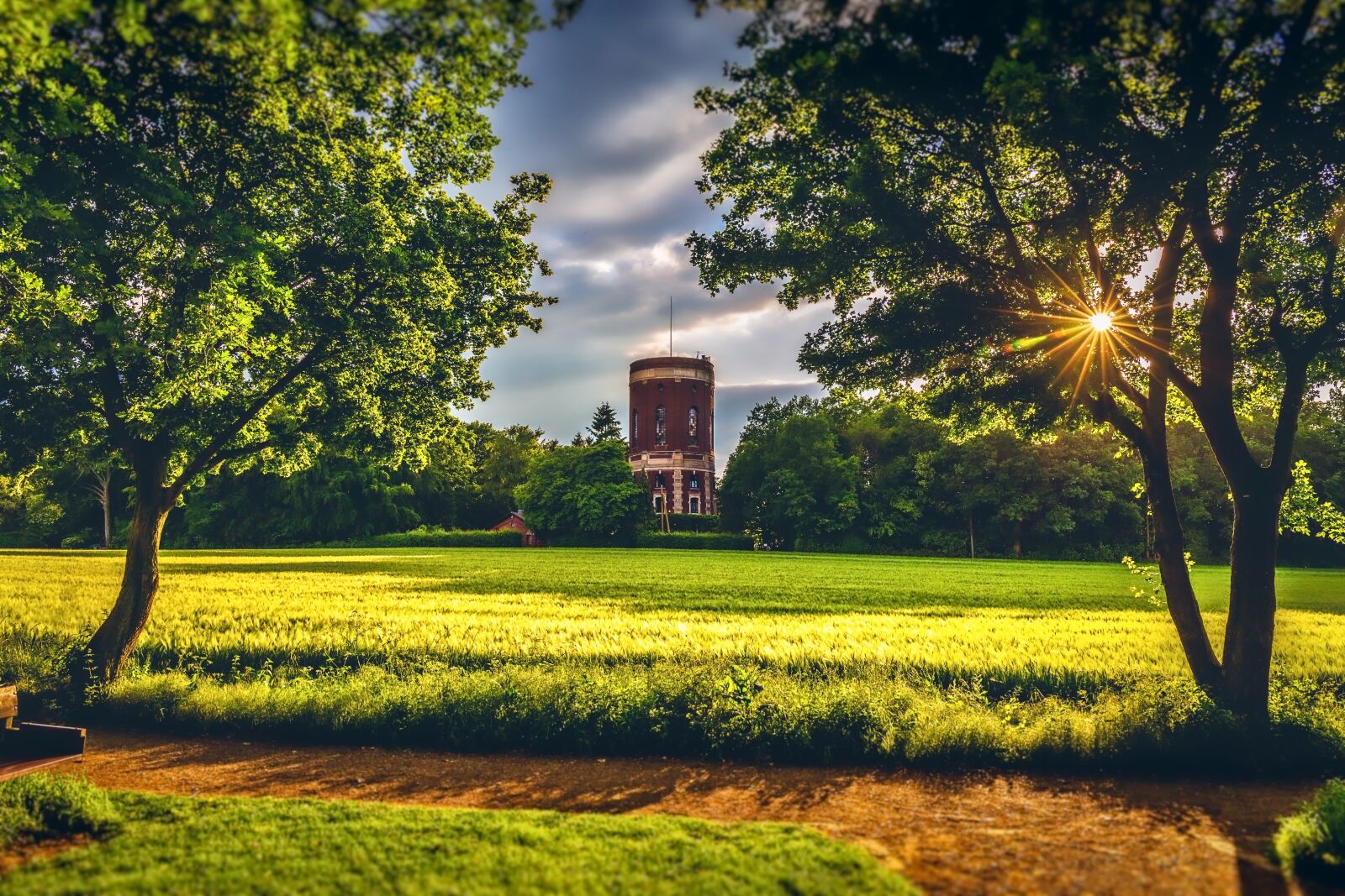 Canon EF 24-70mm F4L IS USM sample photo. Water tower, sunset, colourful photography