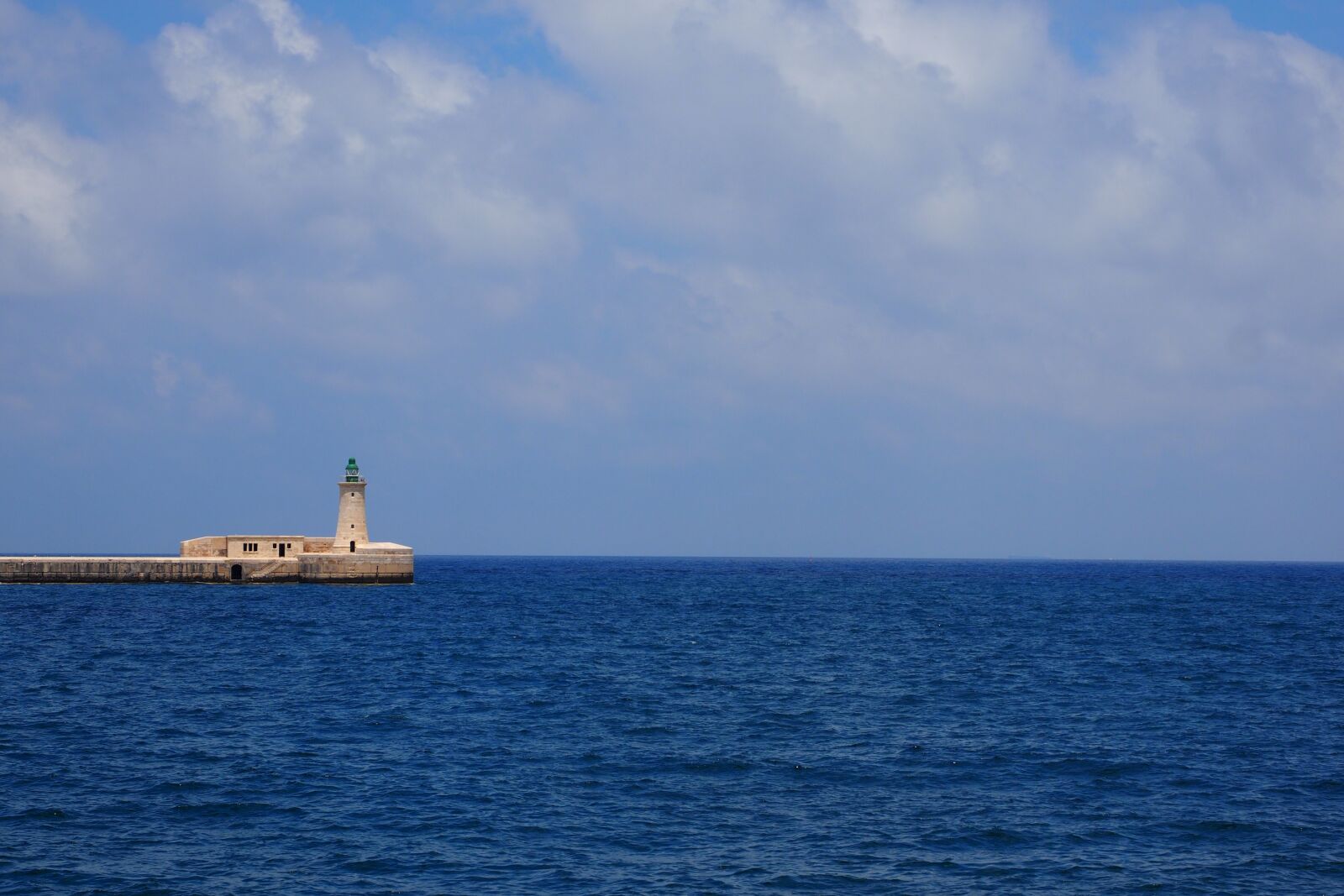 Olympus OM-D E-M1 + Olympus M.Zuiko Digital ED 12-40mm F2.8 Pro sample photo. Malta, sea, lighthouse photography