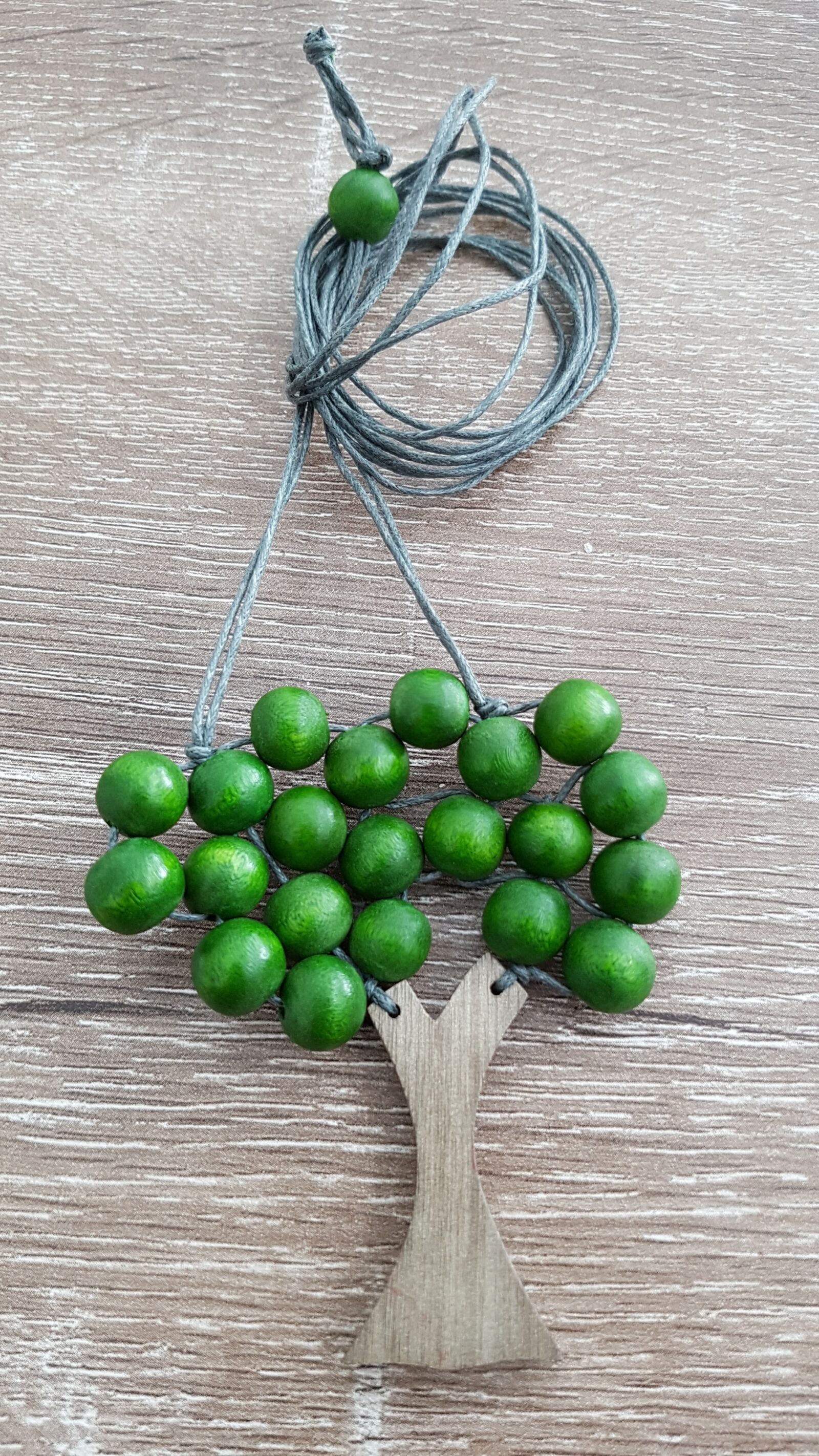 Samsung Galaxy S7 Edge sample photo. Jewelry, green, string photography