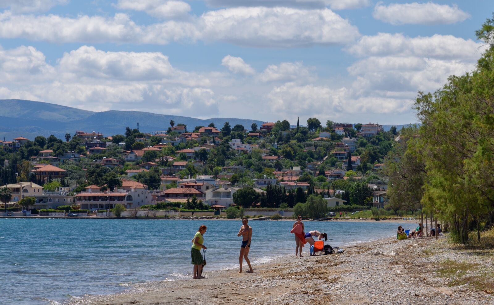 Nikon D750 sample photo. Sandy beach, beach, swimmers photography