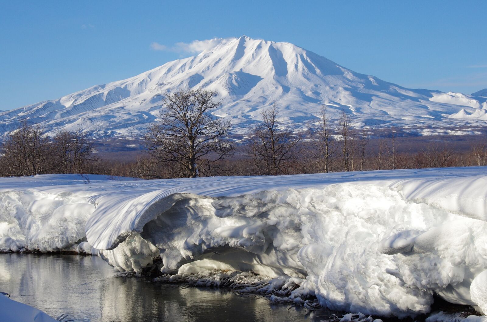 Pentax K-5 sample photo. Volcano, river, beach photography