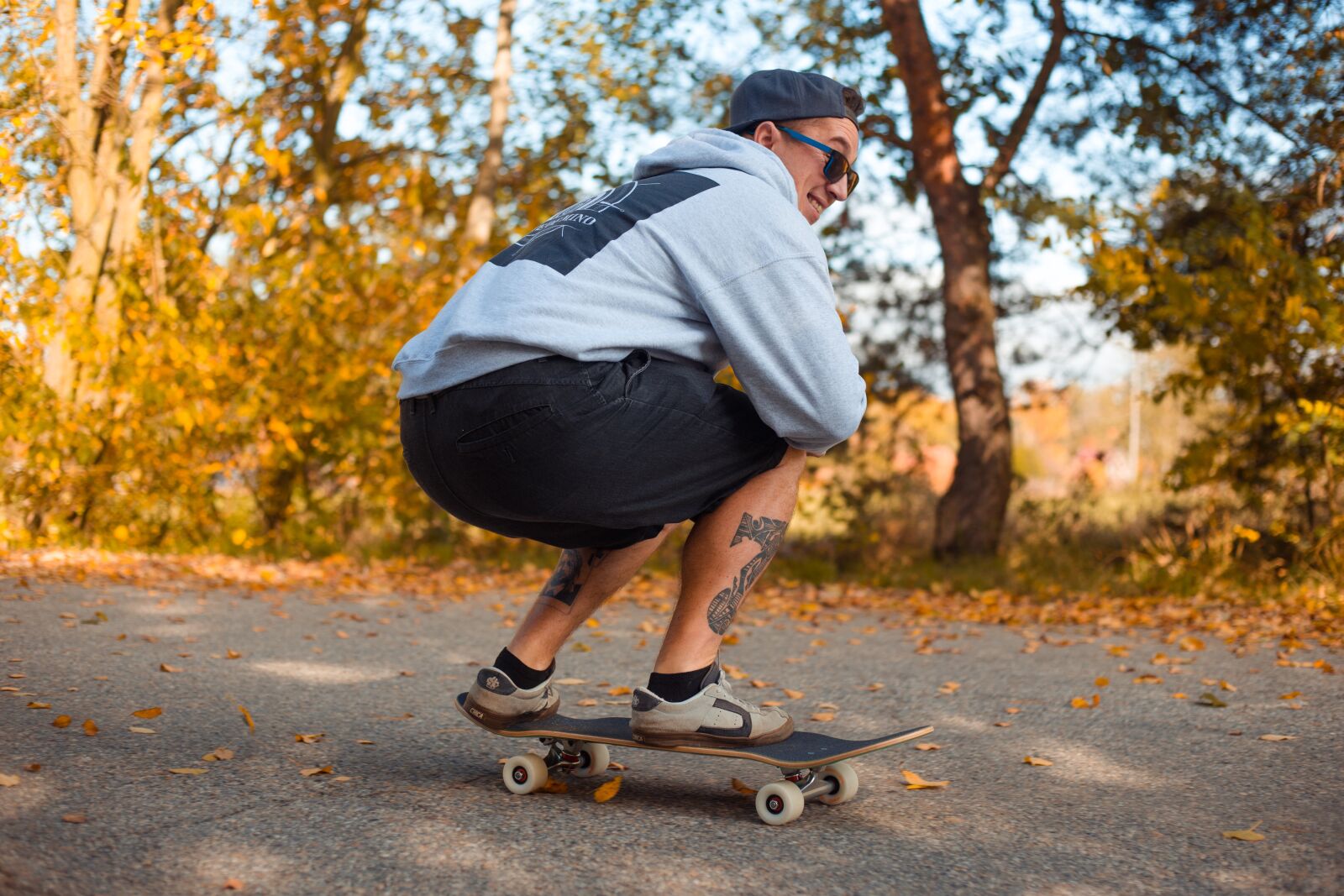 Canon EF 50mm F1.8 II sample photo. Skateboard, man, autumn photography