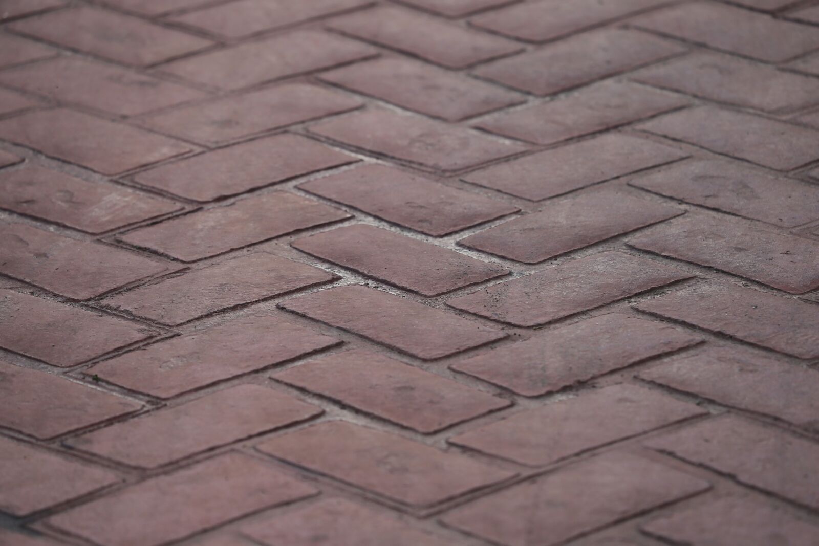 Canon EF 70-300 F4-5.6 IS II USM sample photo. Road, pattern, red bricks photography