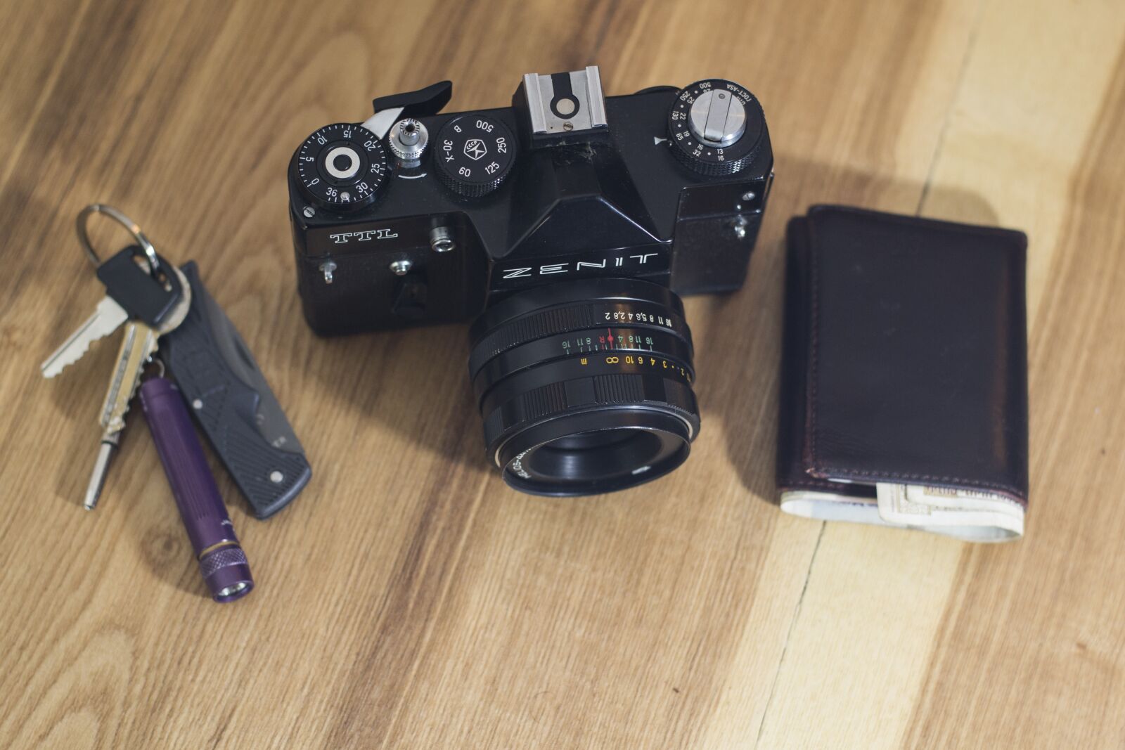 Nikon D3100 sample photo. Desk, camera, wallet photography