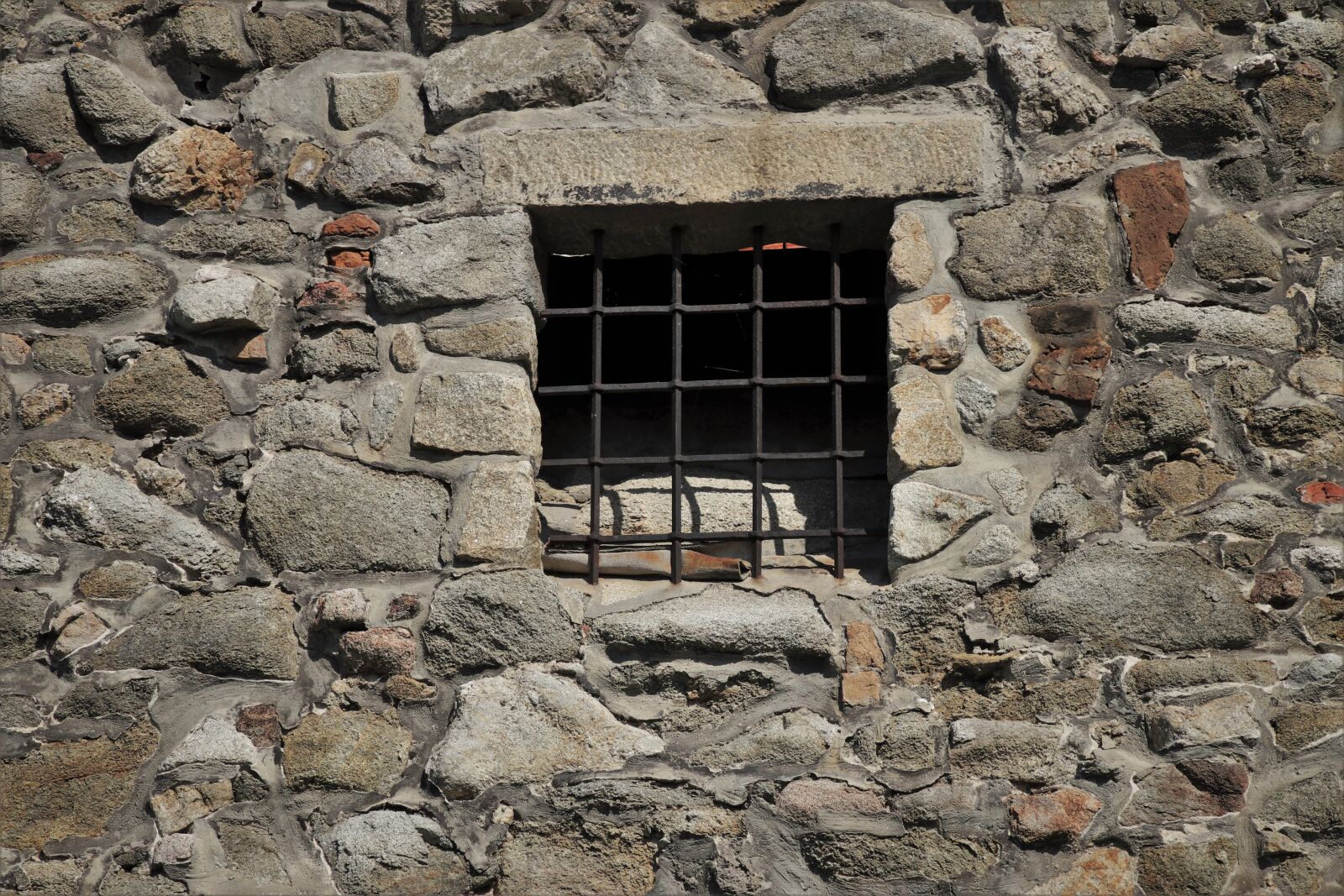 Canon EOS 80D sample photo. Stone wall, grating, iron photography