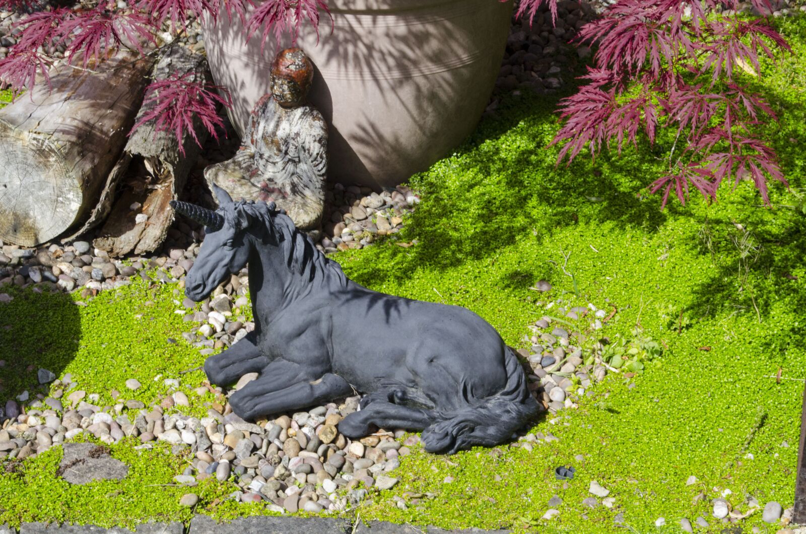 Nikon D5100 sample photo. Unicorn, garden ornament, garden photography