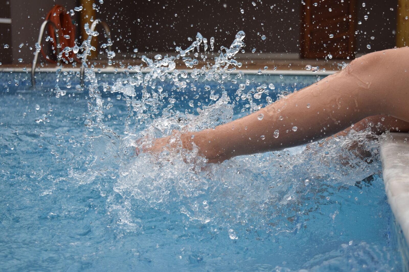 Nikon D5300 sample photo. Feet tapping on water photography