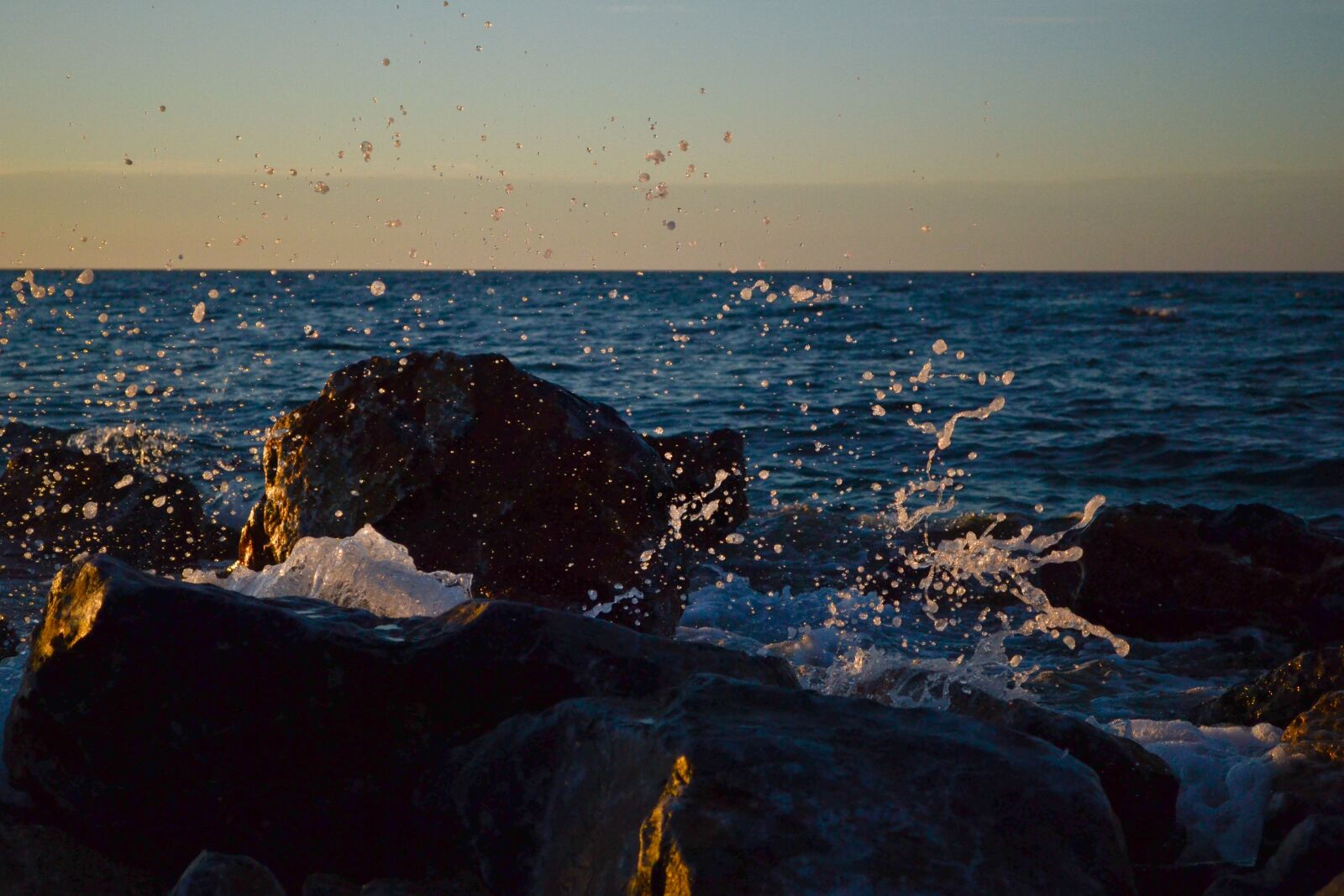 Nikon D3100 sample photo. Waves, rock, scum photography