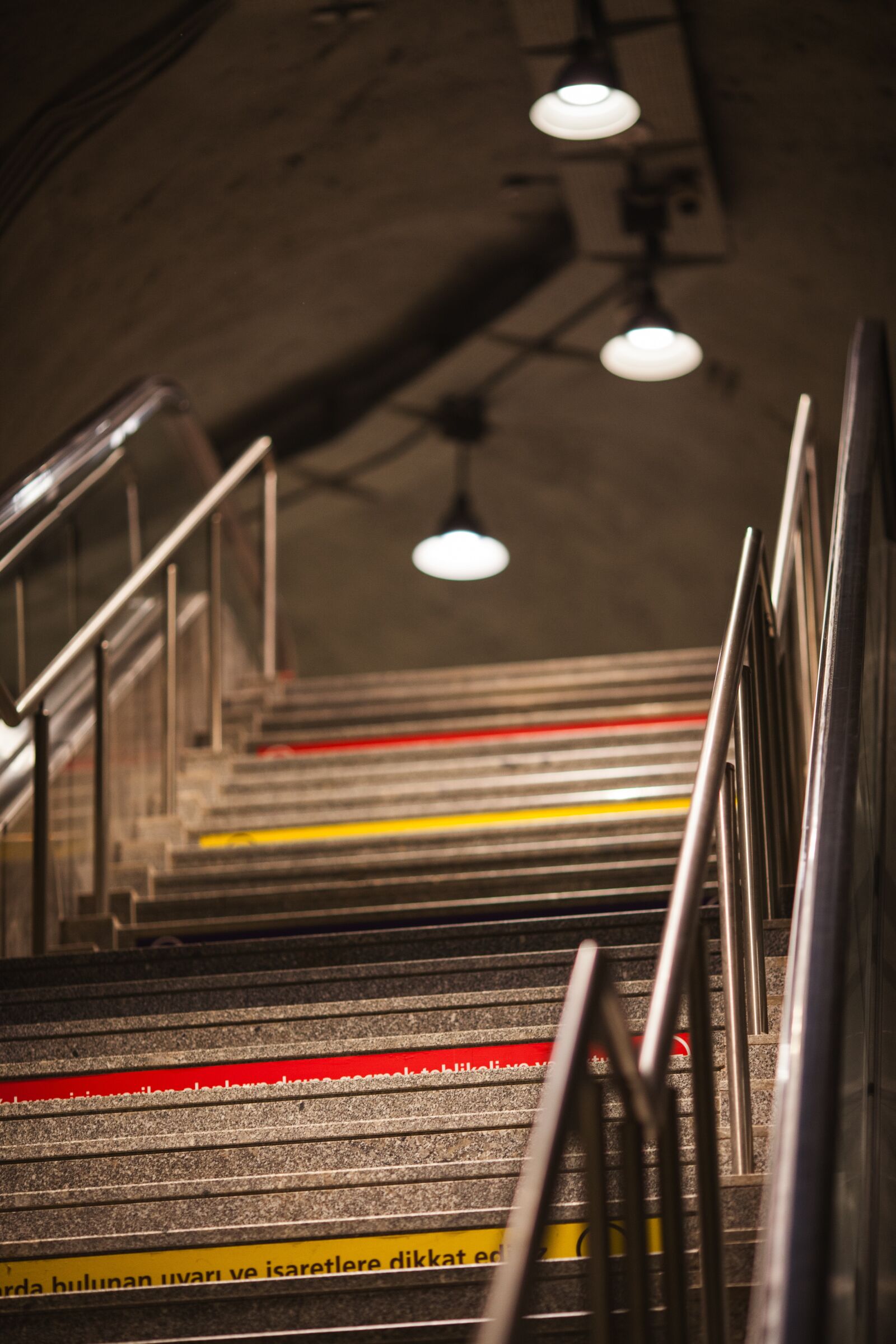 Canon EOS 5D Mark II + Canon EF 135mm F2L USM sample photo. Stairs, color, subway photography