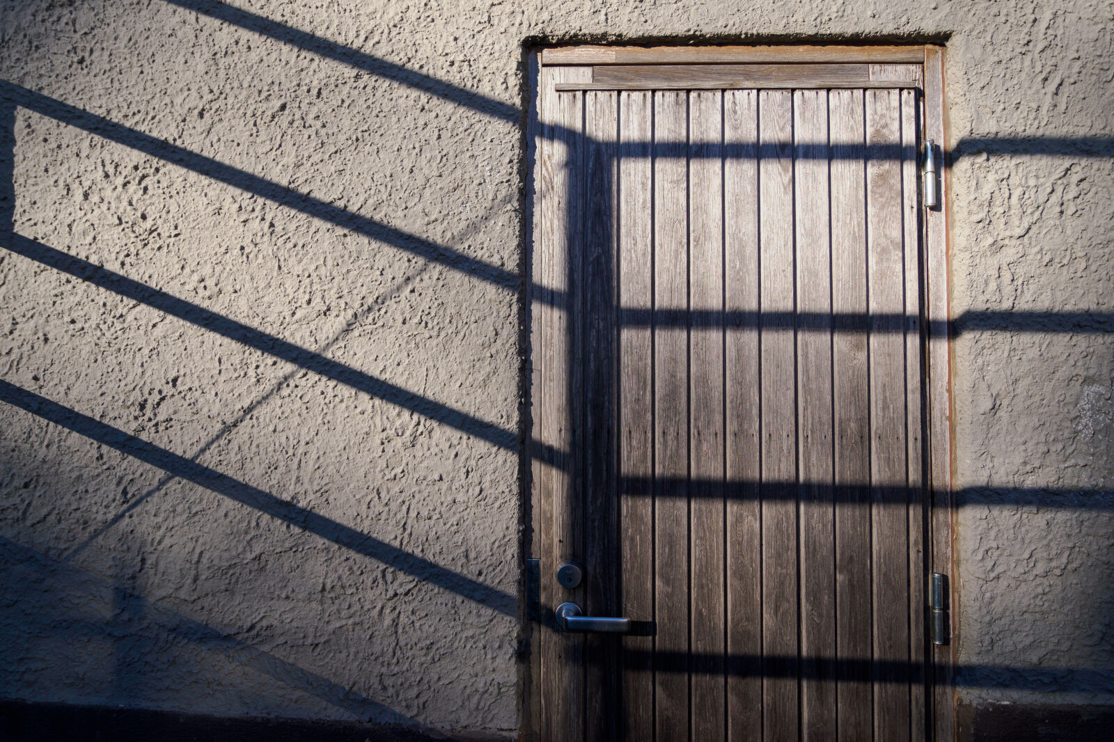 OM System OM-1 Mark II sample photo. Shadow doorway photography