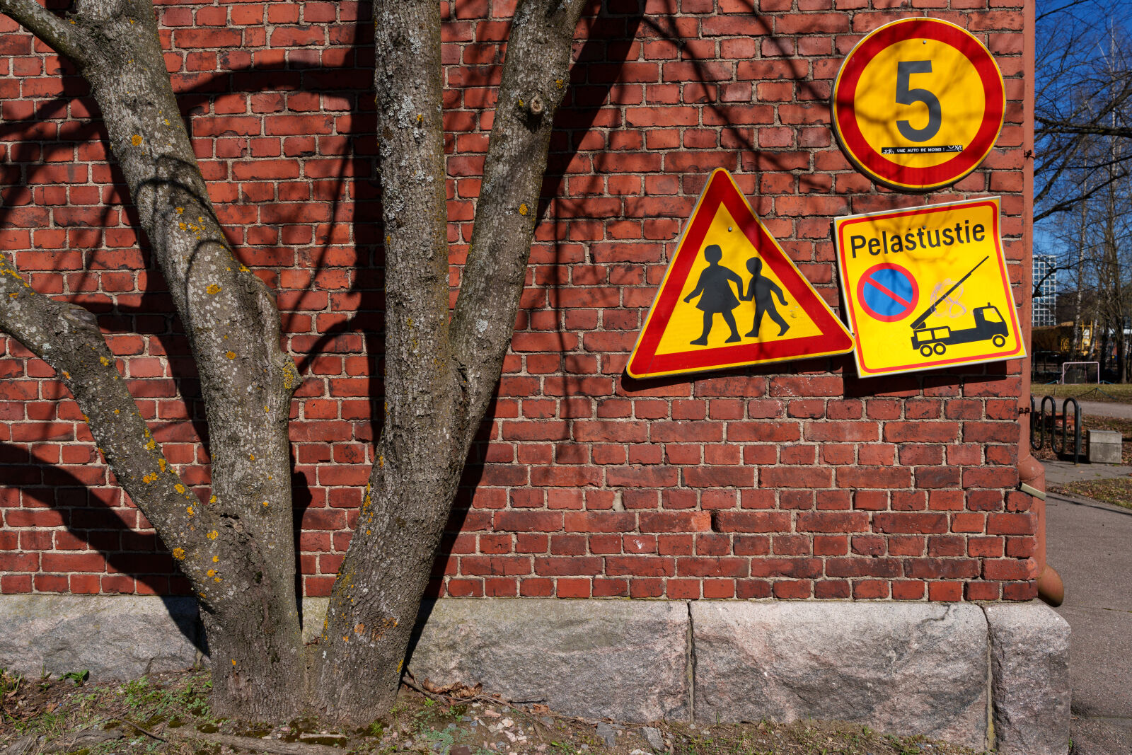Sony a7R V sample photo. Brickwall signs photography