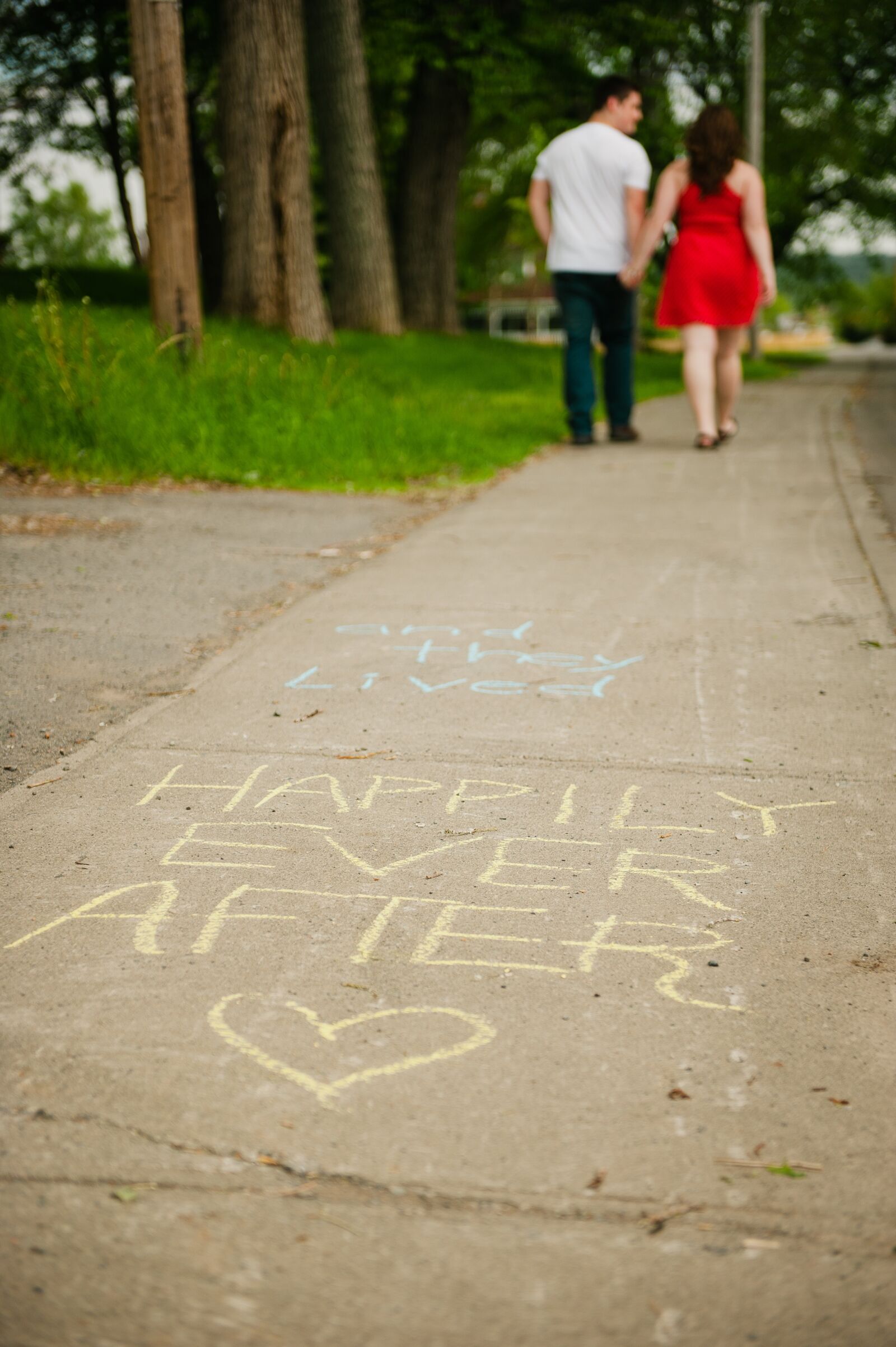 Nikon D700 sample photo. Chalk, sidewalk, couple photography