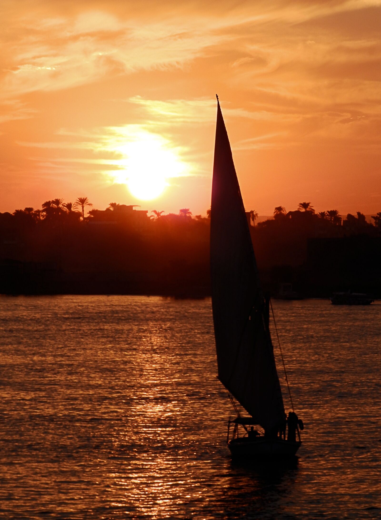 Olympus SP-820UZ sample photo. Boat, sunset, nil photography