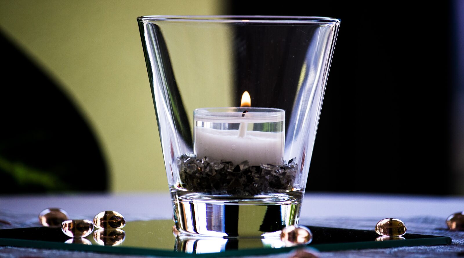 Canon EF-S 55-250mm F4-5.6 IS sample photo. Glass, reflection, candle photography