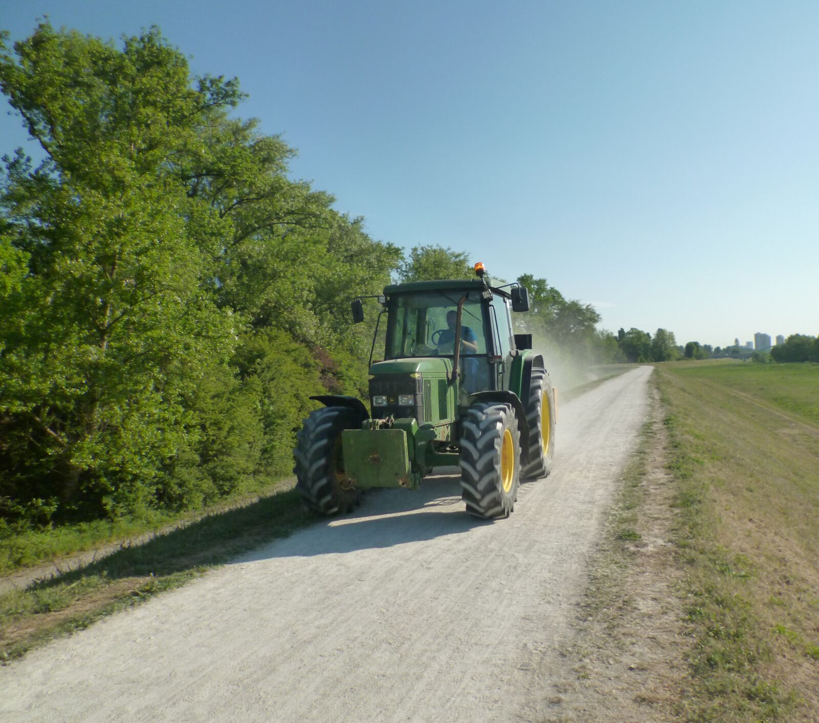Panasonic DMC-FS40 sample photo. Tractor, country road, farming photography