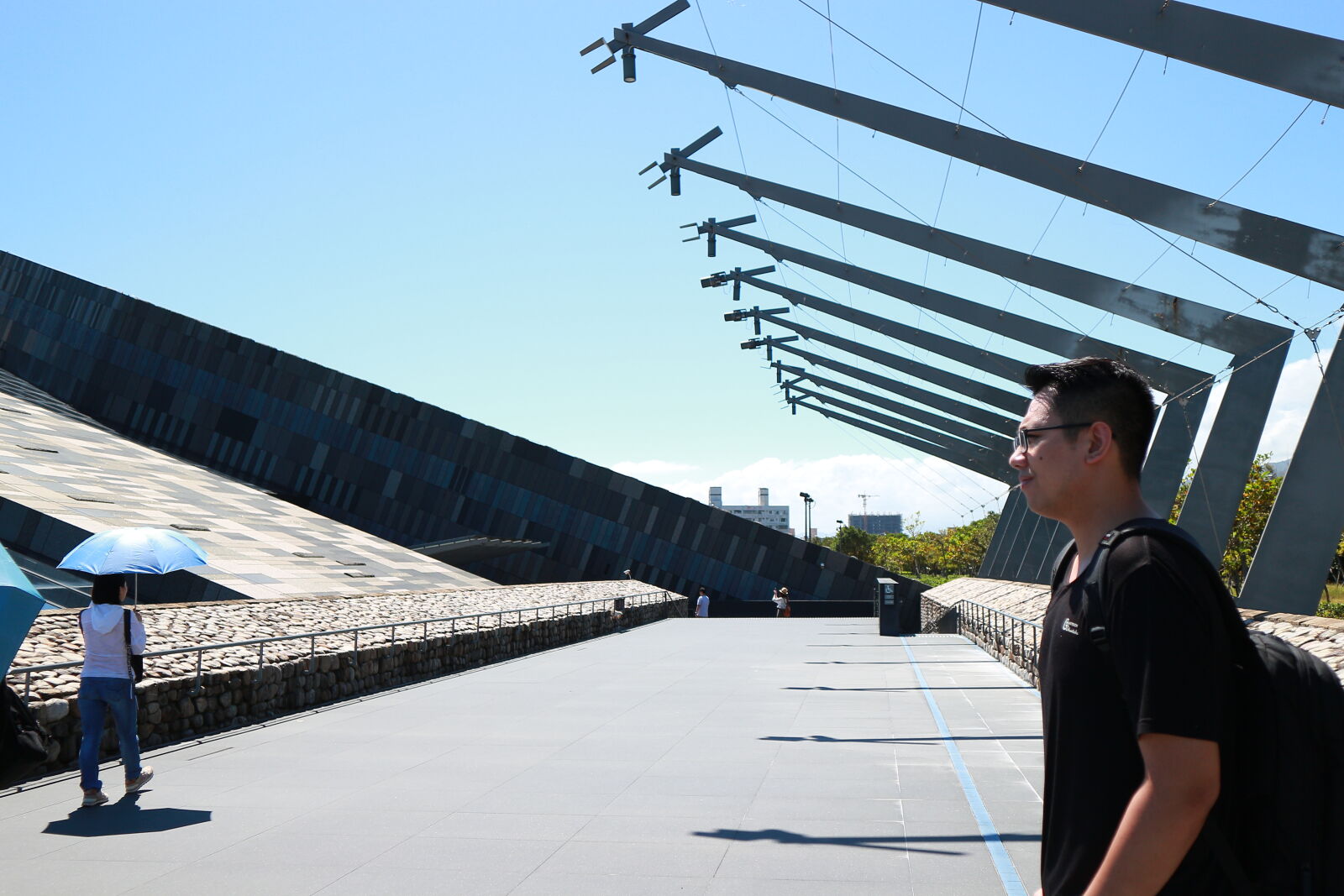 Canon EOS M sample photo. Man, using, mobile, phone photography