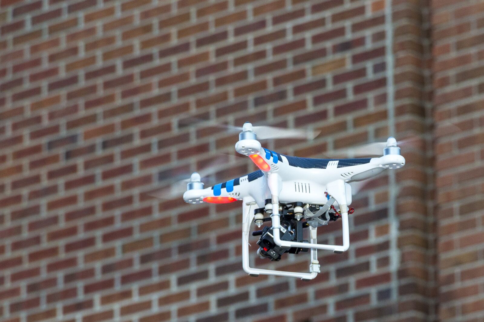 Canon EOS 650D (EOS Rebel T4i / EOS Kiss X6i) sample photo. Drone, brick wall, flying photography