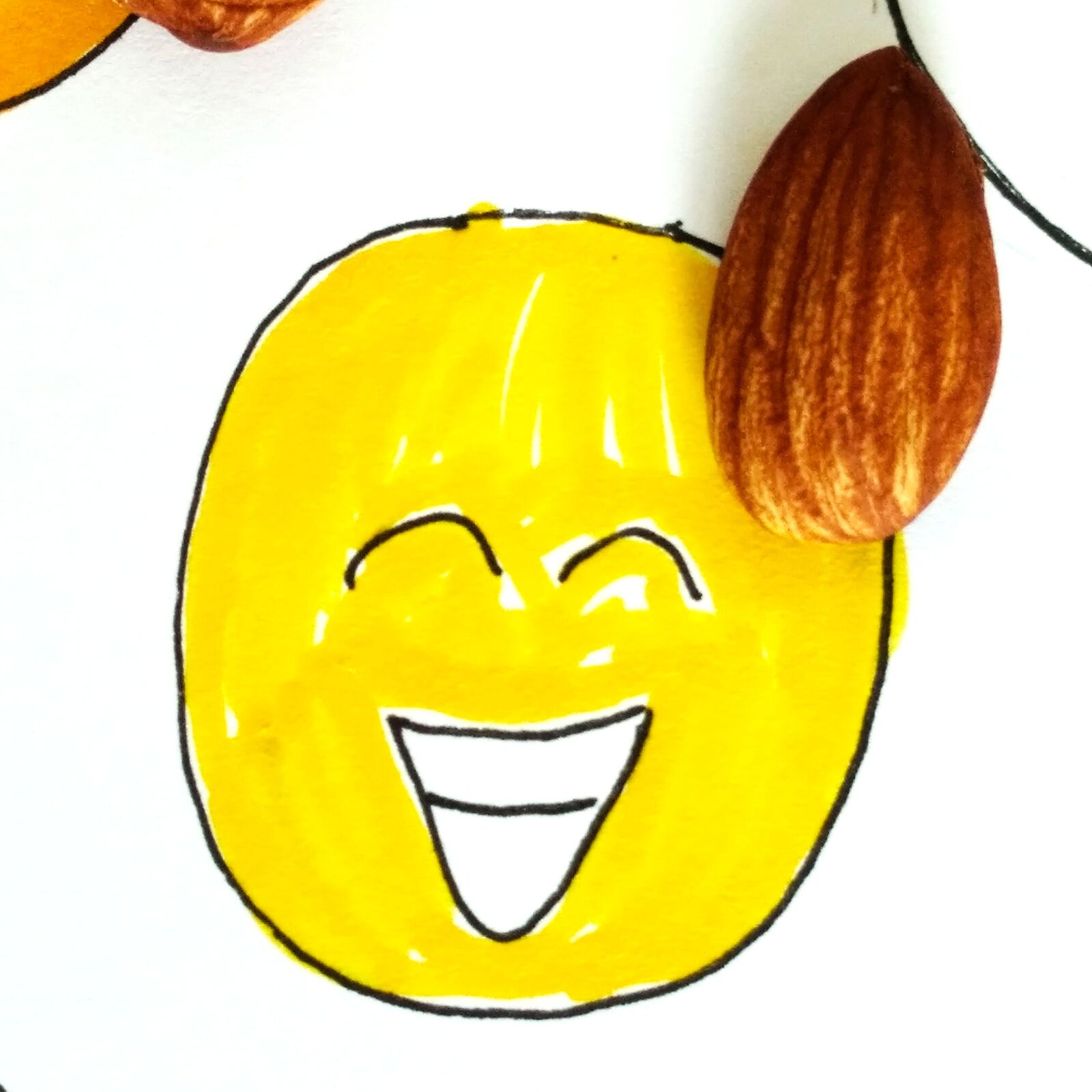 Xiaomi Redmi 7A sample photo. Emoticon, emoji, almond photography