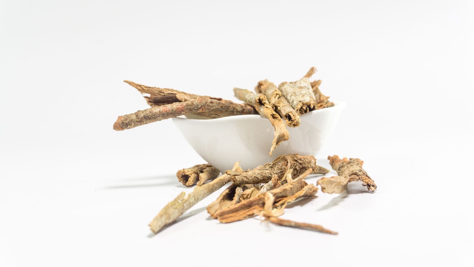Sony a5100 sample photo. Dried cassia, bark, white photography